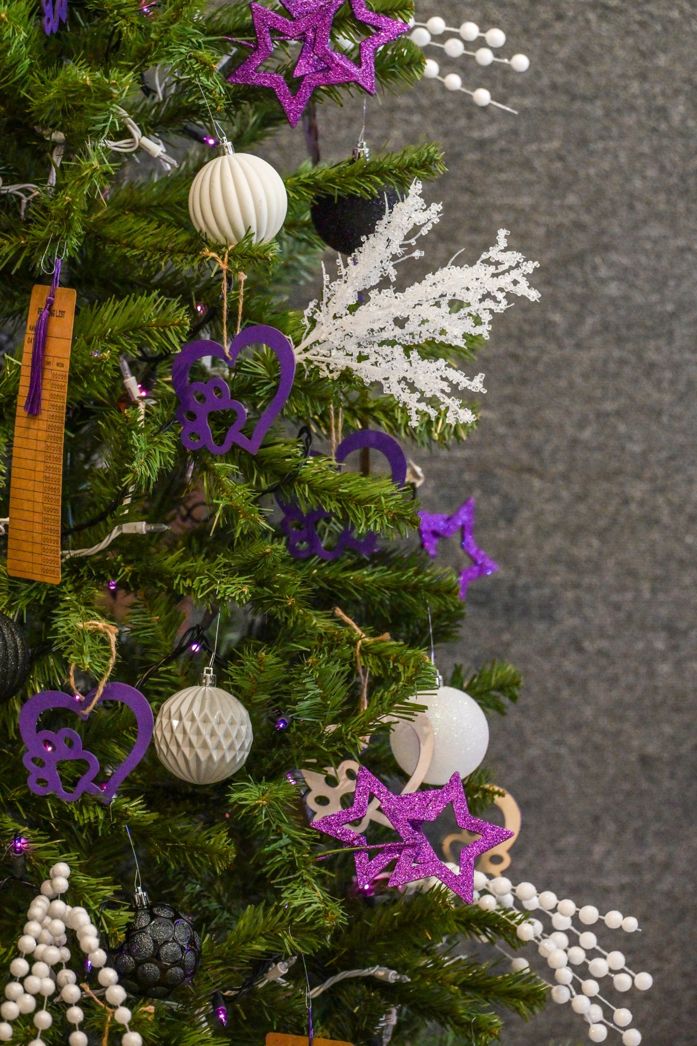 Rescue-themed tree detail with purple ornaments